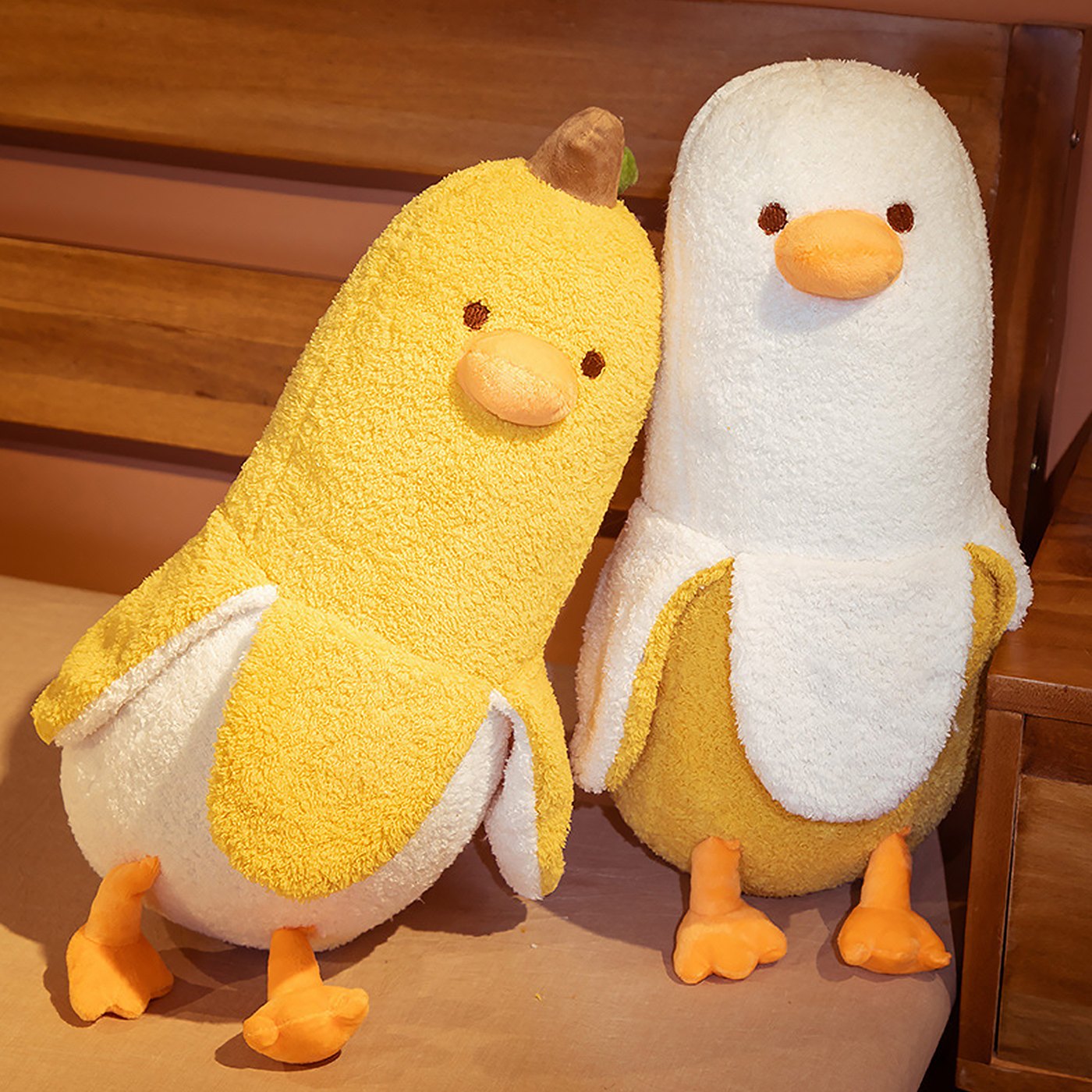 Banana duck plushies in yellow and white
